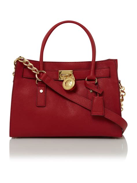 michael kors red cross bag|red michael kors tote bag.